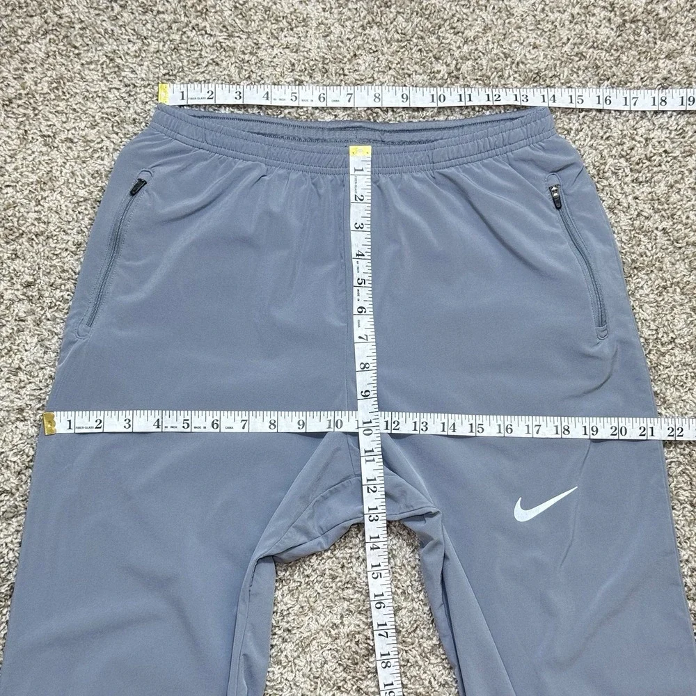 Nike Mens L Dri-FIT Flex Running Pants Gray Tapered Zip Cuff Reflective 885280